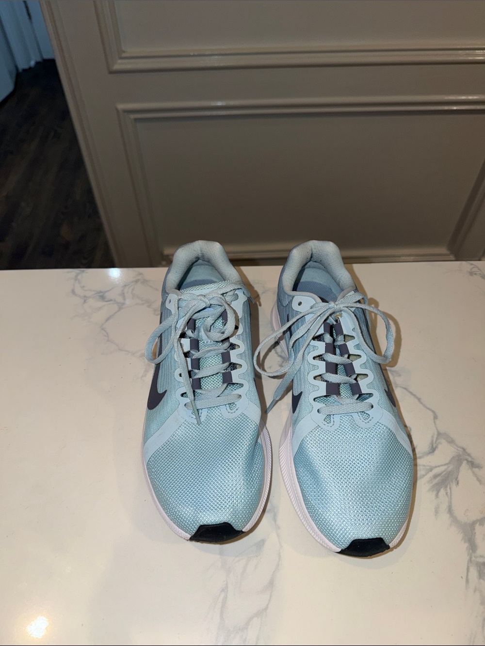 Nike Women's Light Blue Athletic Sneakers with Charcoal Gray Swoosh